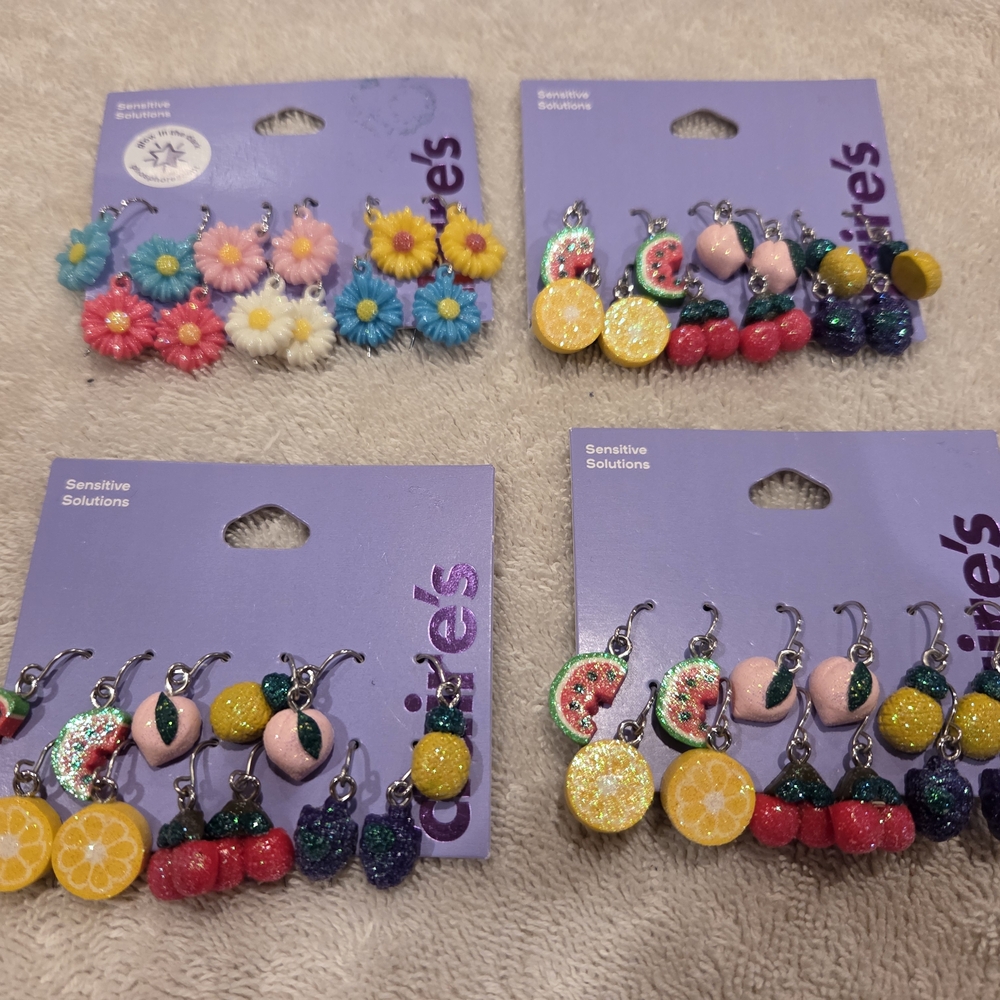 24 pairs of Claire's Colorful Fruit and Glow In The Dark Flower Earrings